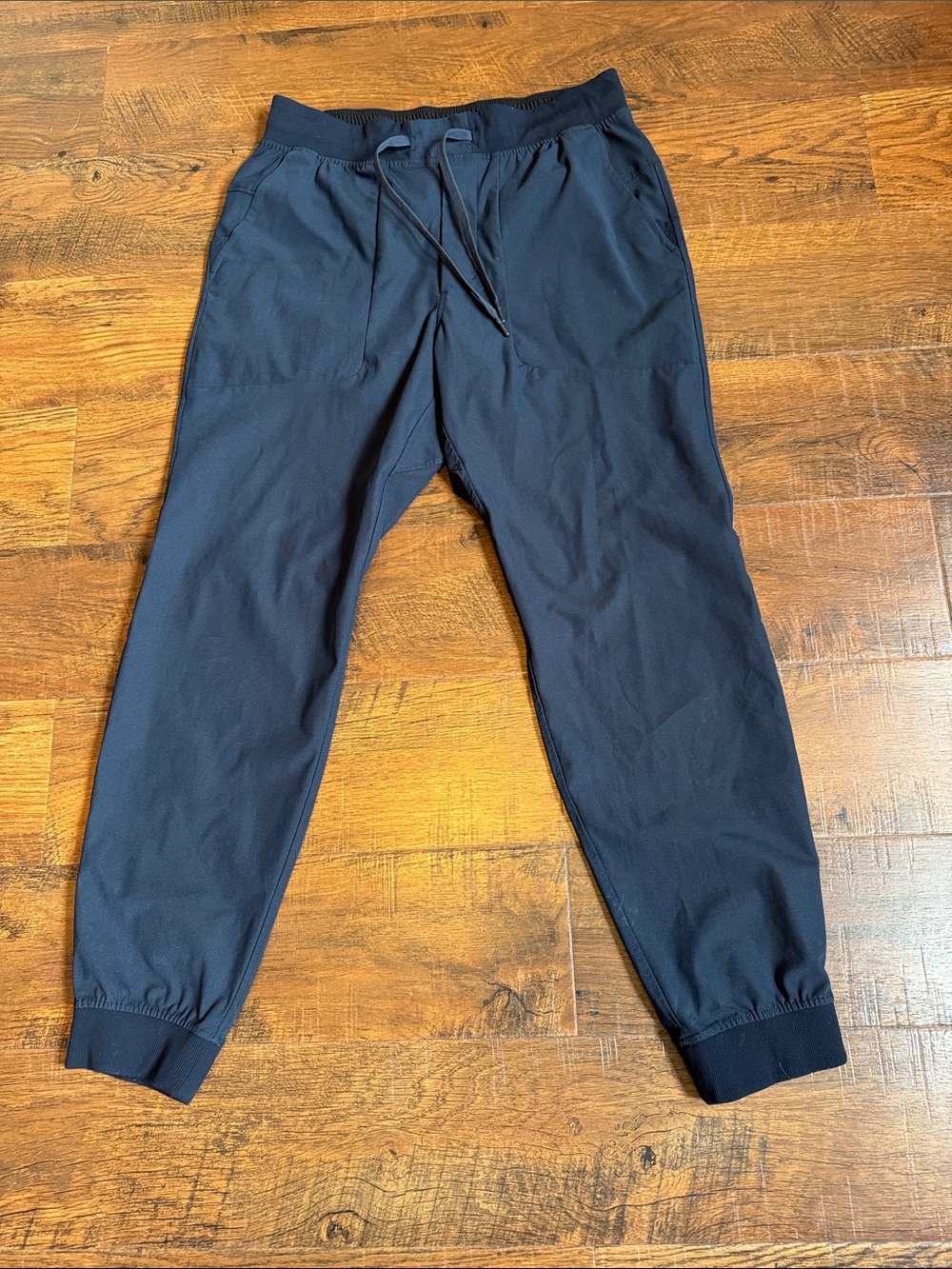 Like new mens size Large Lululemon joggers in true navy blue color.